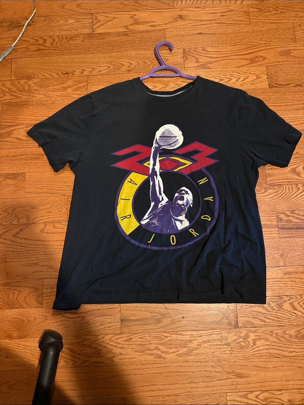 Jordan Black Short-Sleeve Graphic Tee with Purple and Yellow Accents